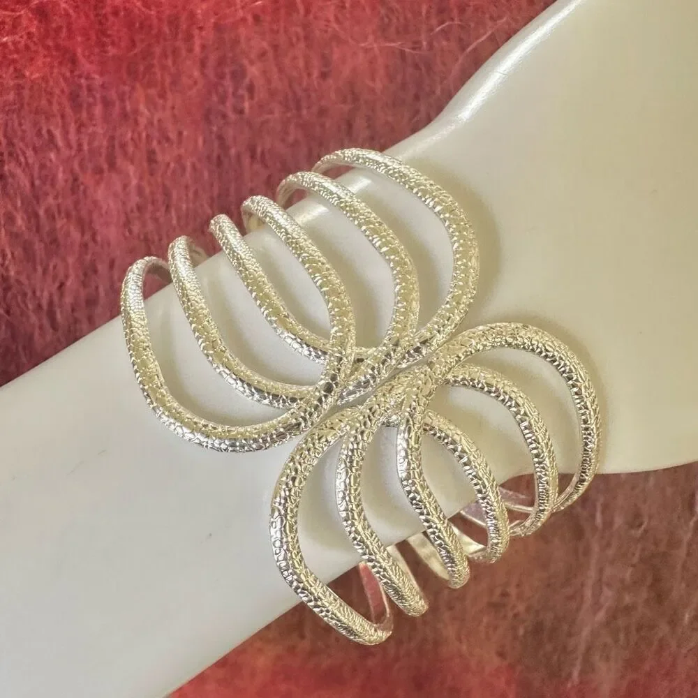 Silver tone textured hinged wide bracelet